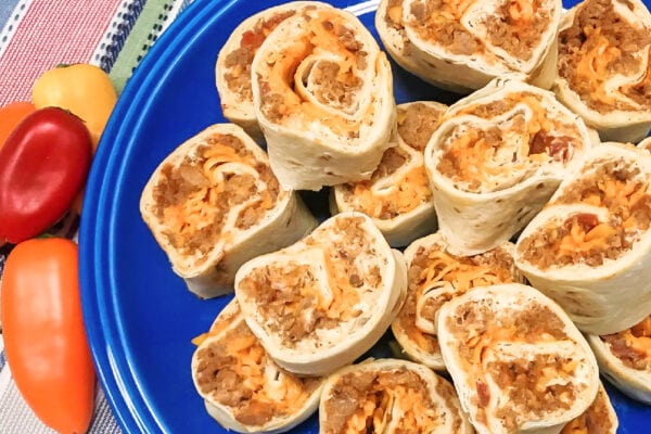 A big serving platter with party pinwheels. 