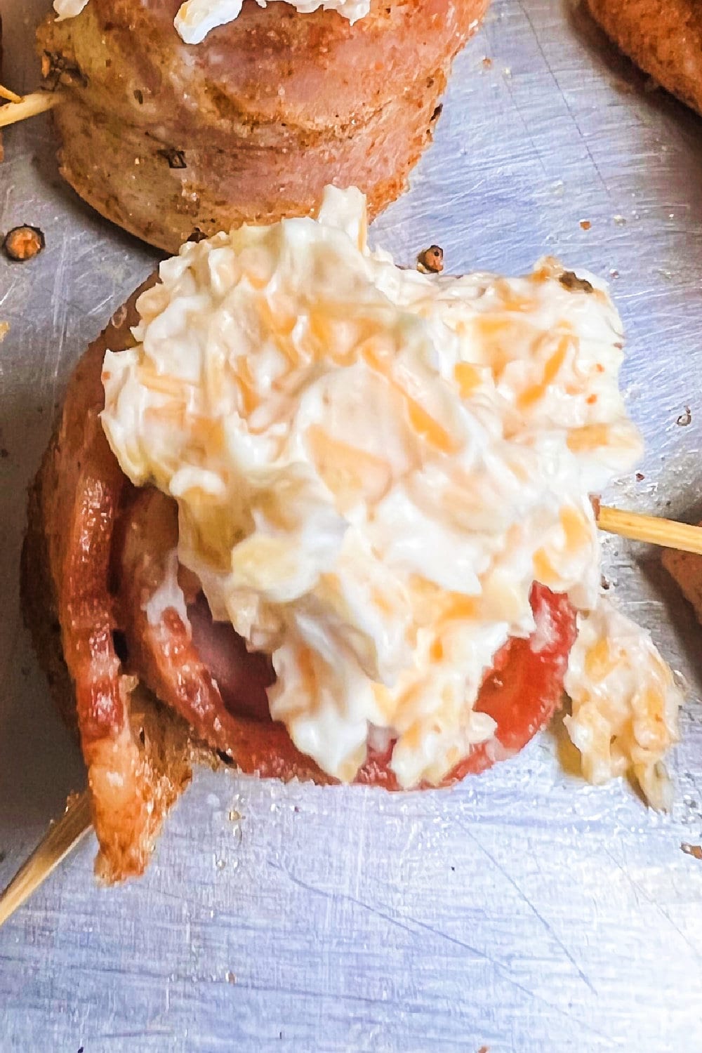 Stuffed kielbasa sausage shots topped with cream cheese filling.
