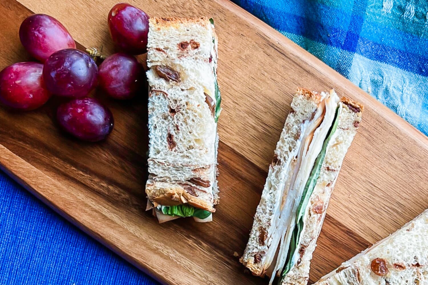 Tea sandwiches with turkey and basil. 