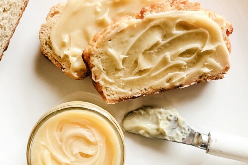 Honey butter spread spread over sliced bread.