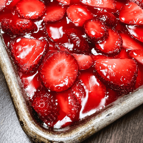 Strawberry slab pie in large pan for serving.