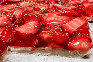 Strawberry Slab Pie sliced and ready to serve.