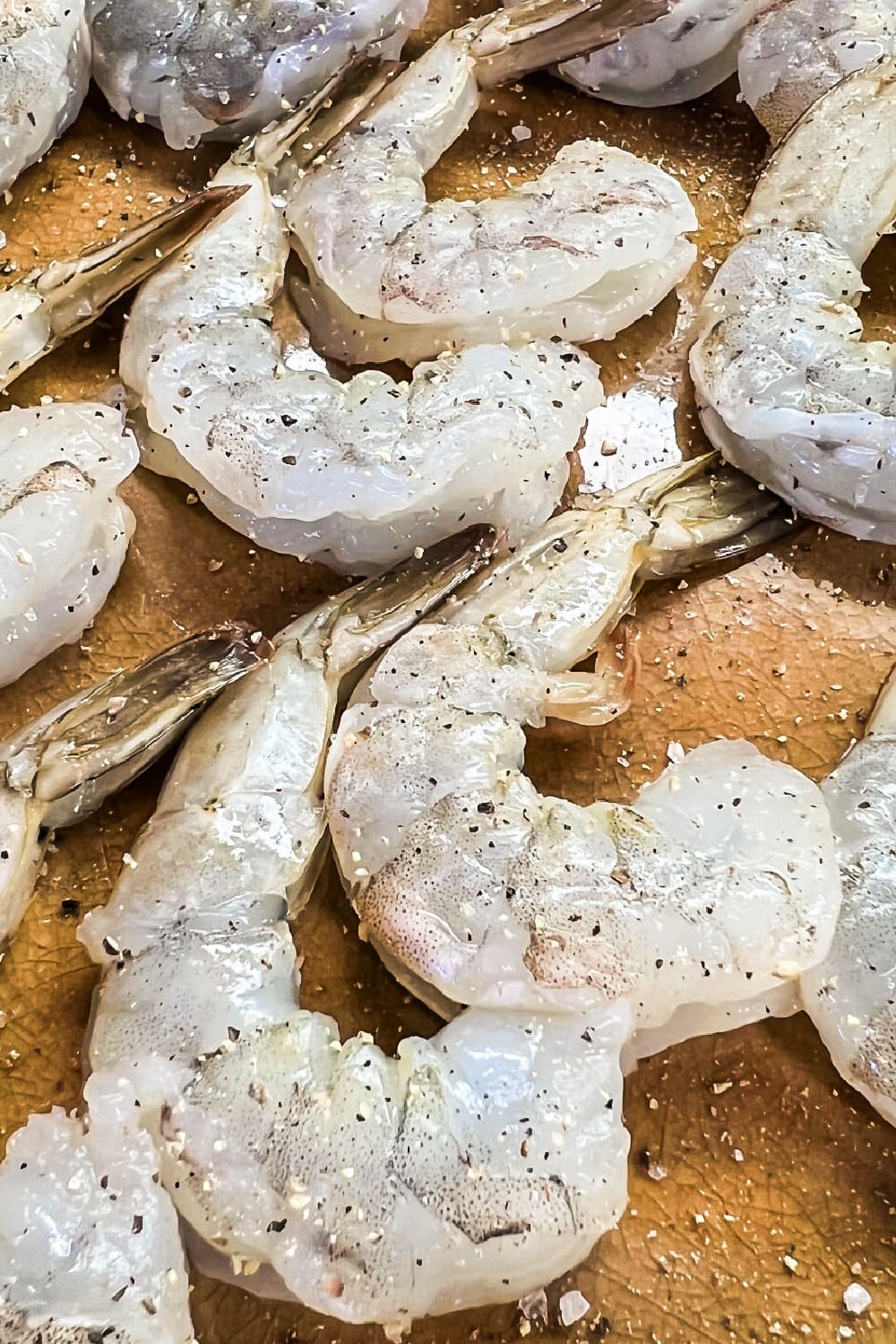 Raw shrimp ready to be breaded and air fried.