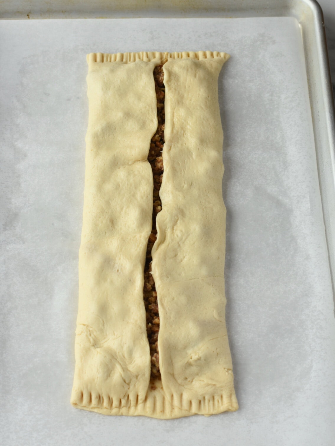 Uncooked dessert filled and formed, ready for baking. 