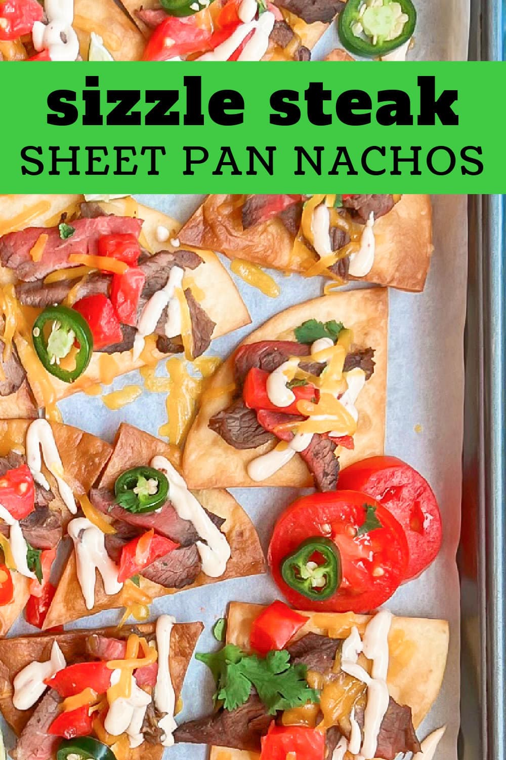 Sheet pan nachos with sizzle steak and toppings. 