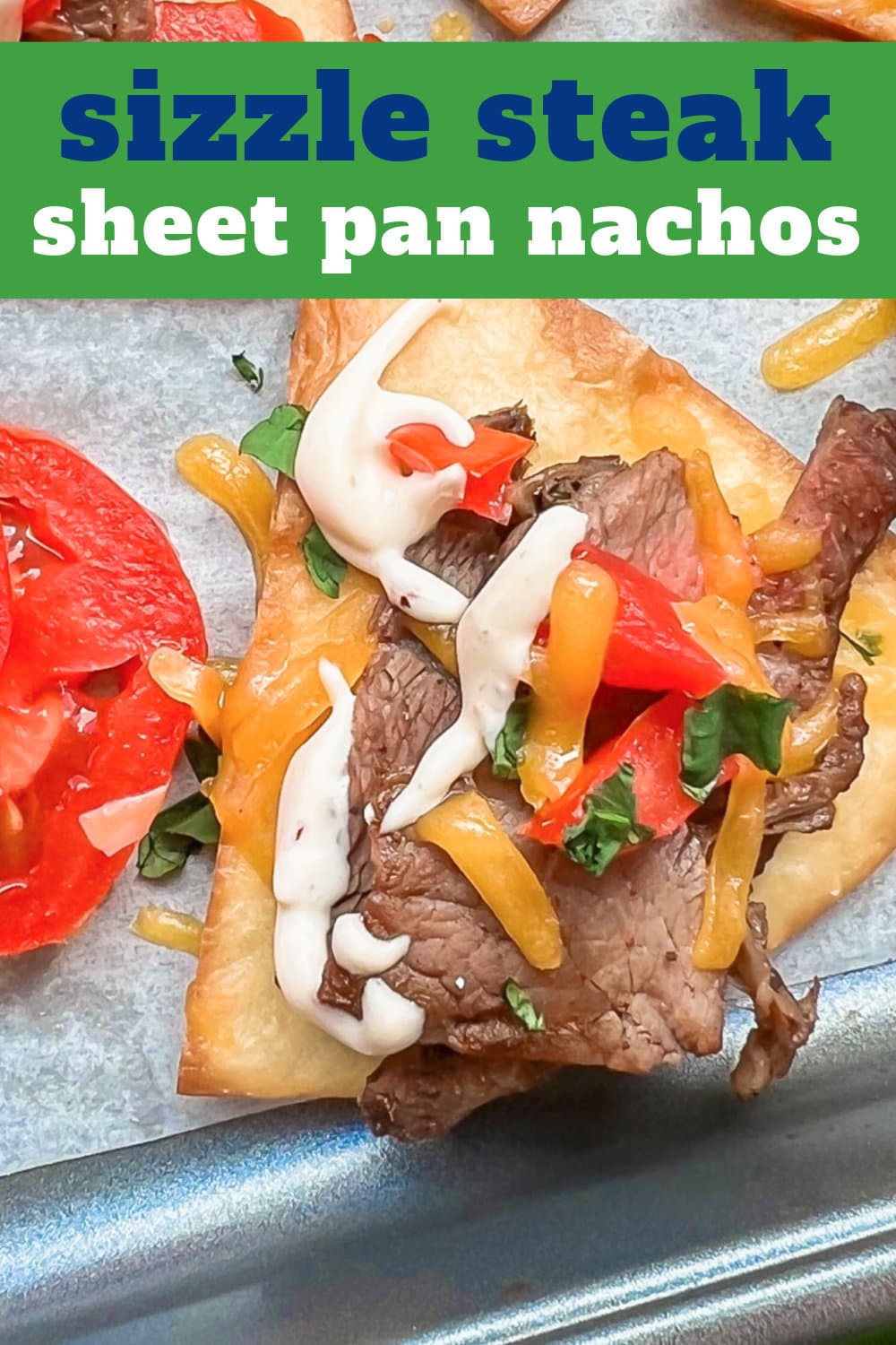 Sizzle Steak Beef Nachos on a sheet pan, ready to eat. 