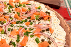 A Smoked Salmon Brie Cheese Butter Board ready to enjoy.