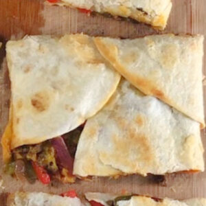 Sheet pan quesadillas hot and fresh from the oven.