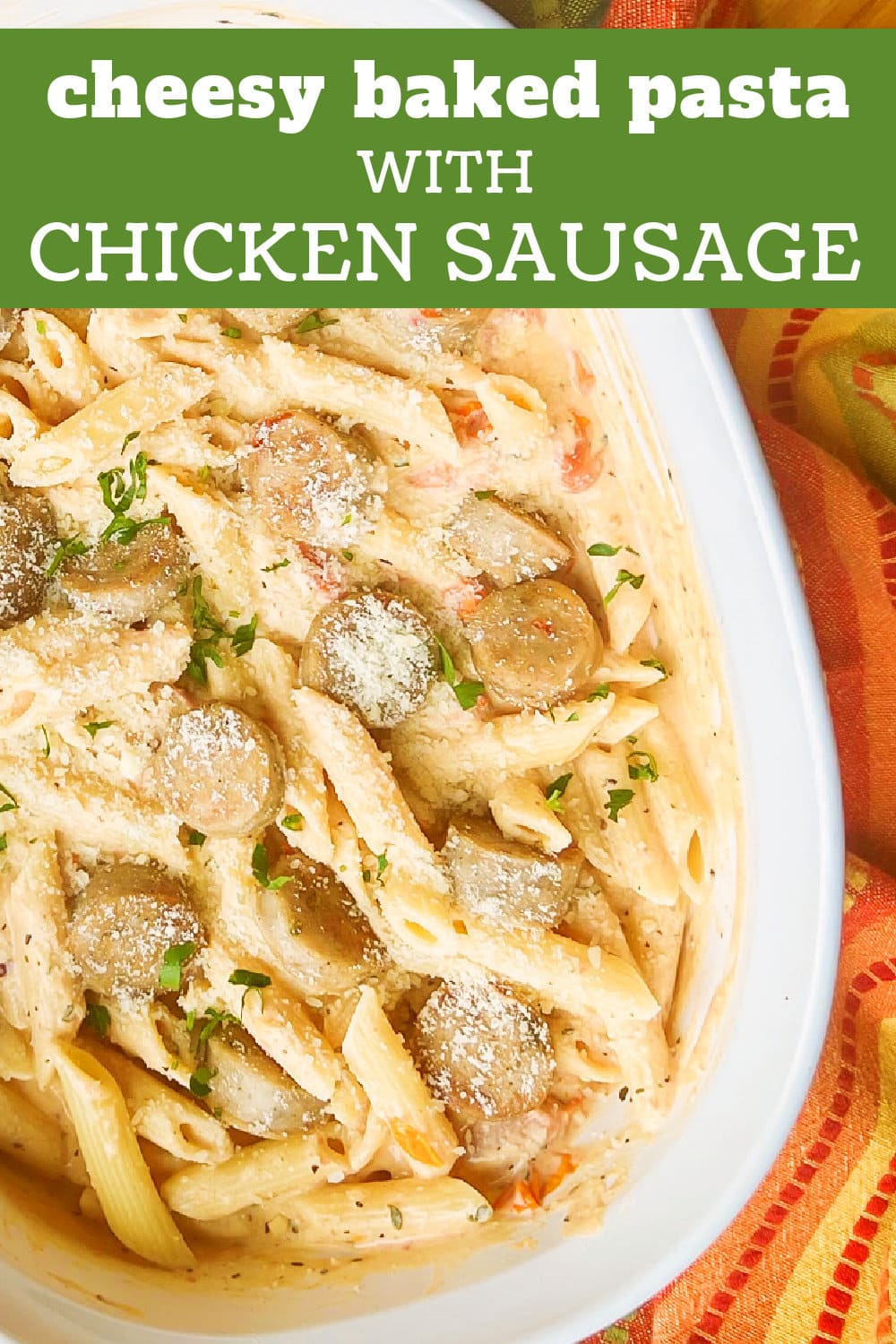 A baking pan full of Cheesy Baked Pasta with Chicken Sausage.