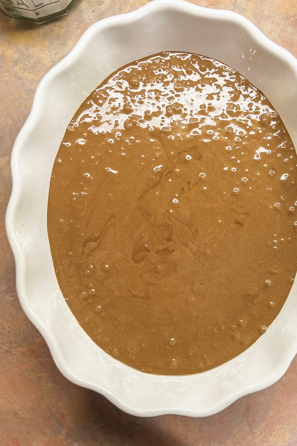 Chocolate Fudge Hot Cocoa Mix batter in a 9x13 pan. 