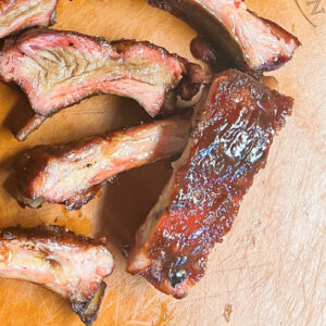 Sticky and caramelized baby back ribs ready to eat.