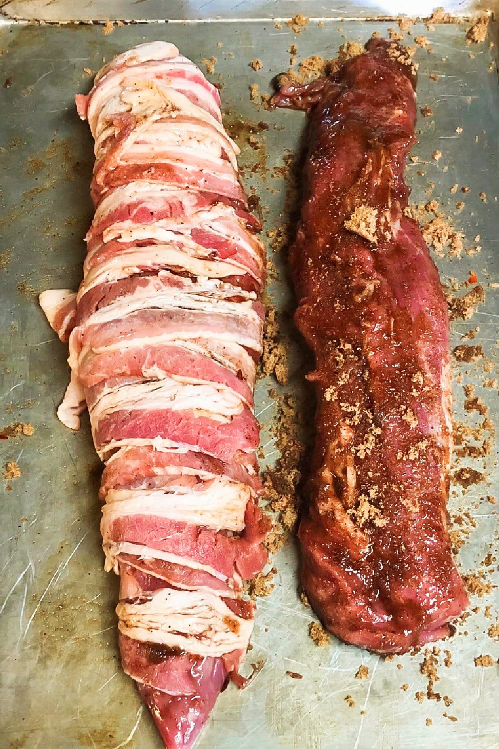 Two pork tenderloins, one seasoned and one bacon-wrapped. 