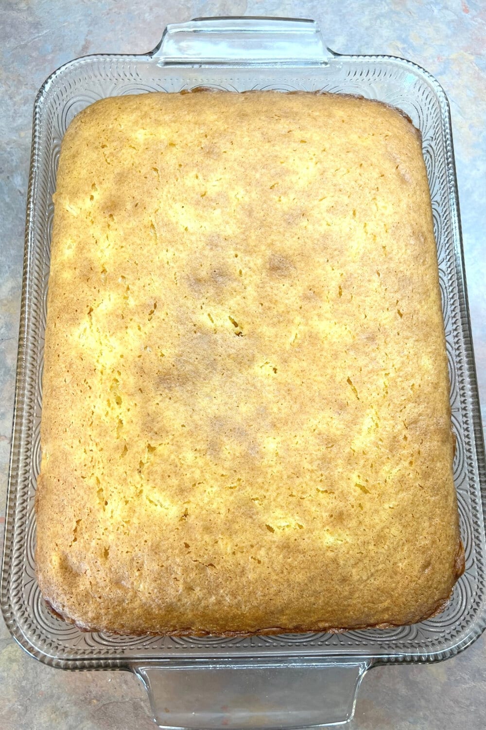 Freshly baked Sunshine Cake in a 9x13 pan. 