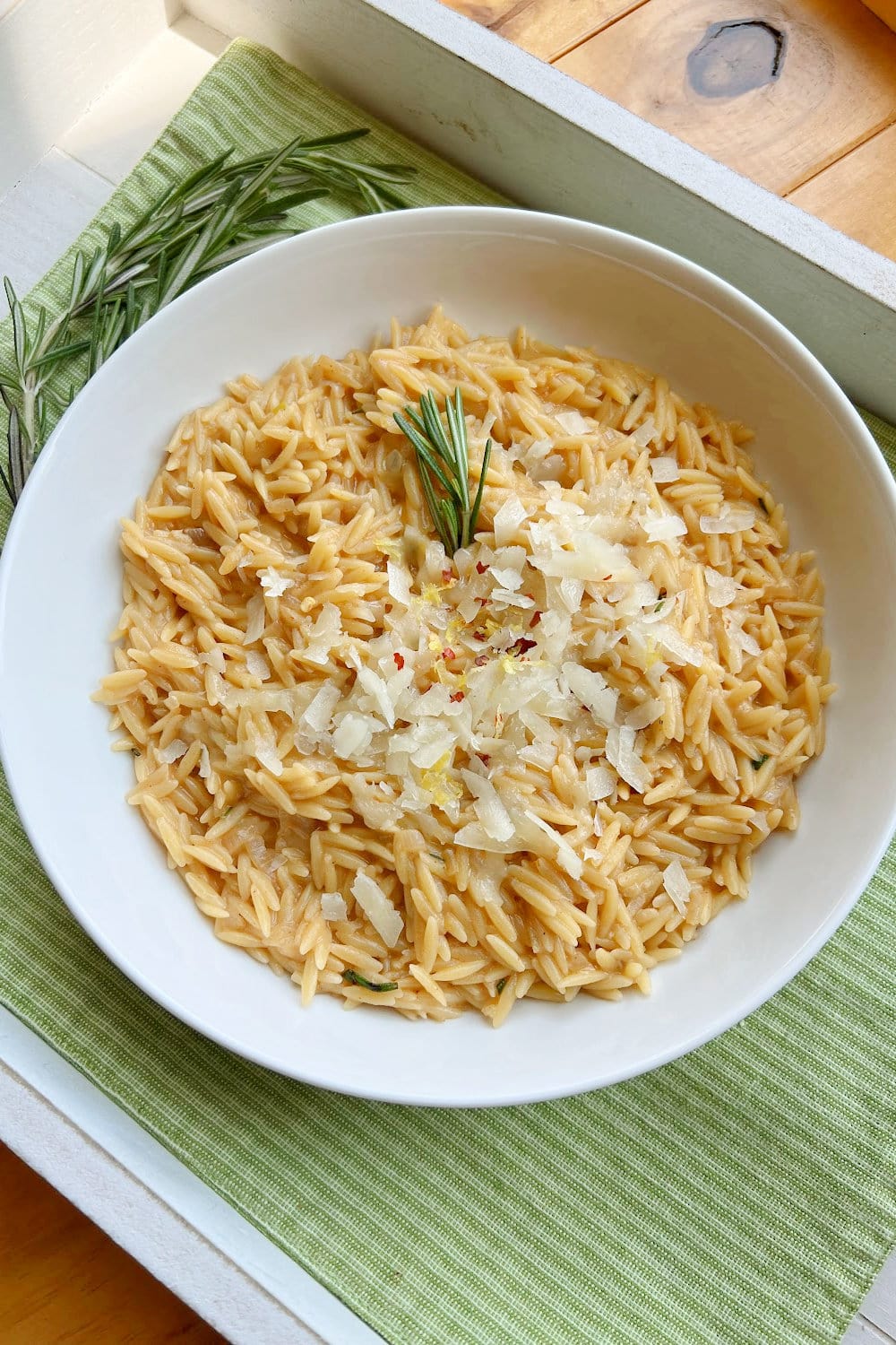 A bowl of Creamy Orzo Pasta with Rosemary Browned Butter. 
