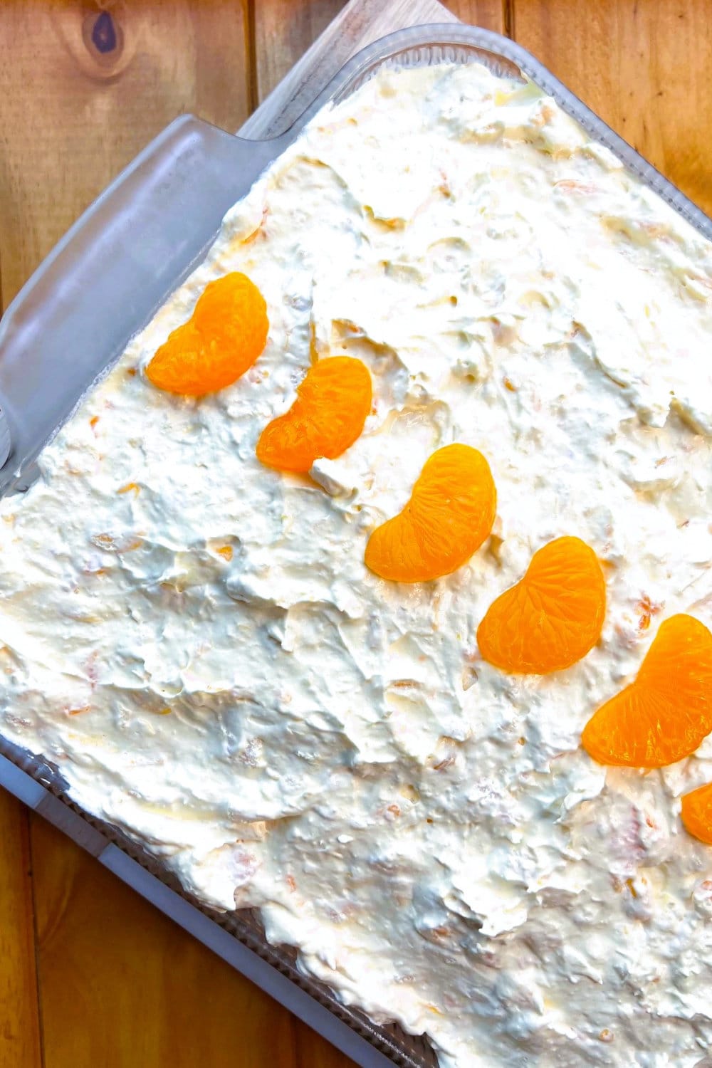 Frosted Sunshine Cake with Mandarin Oranges on top. 