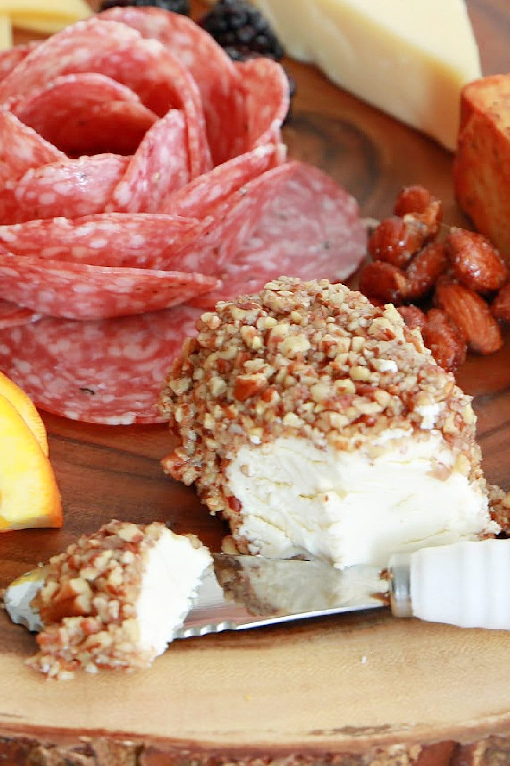 Ready to serve, Honey Pecan Goat Cheese Appetizer as part of a charcuterie board. 
