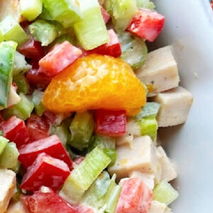 Tropical Turkey Salad in a white serving bowl.