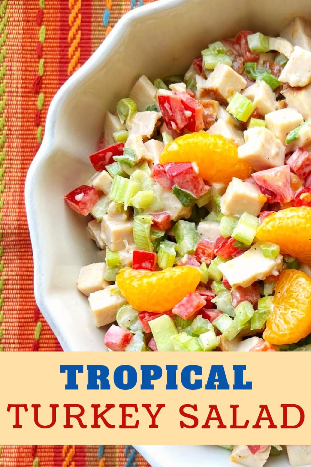 A large bowl of Tropical Turkey Salad, chilled and ready to be enjoyed. 