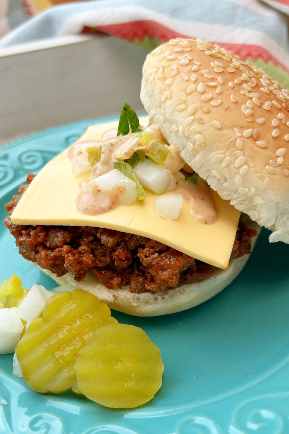 A Big Mac Sloppy Joe with a slice of cheese on top. 