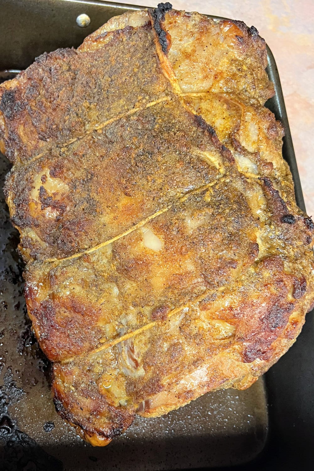 A delicious golden brown prime rib roast, straight from the oven. 