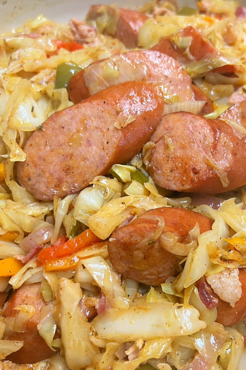 Fried Kielbasa and Cabbage Skillet with Andouille sausage and crispy bacon. 