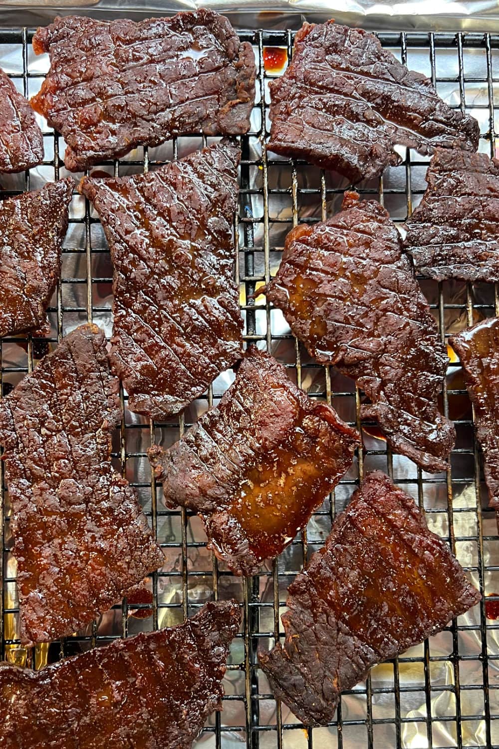 Slices of jerky flipped over half way through the baking time. 