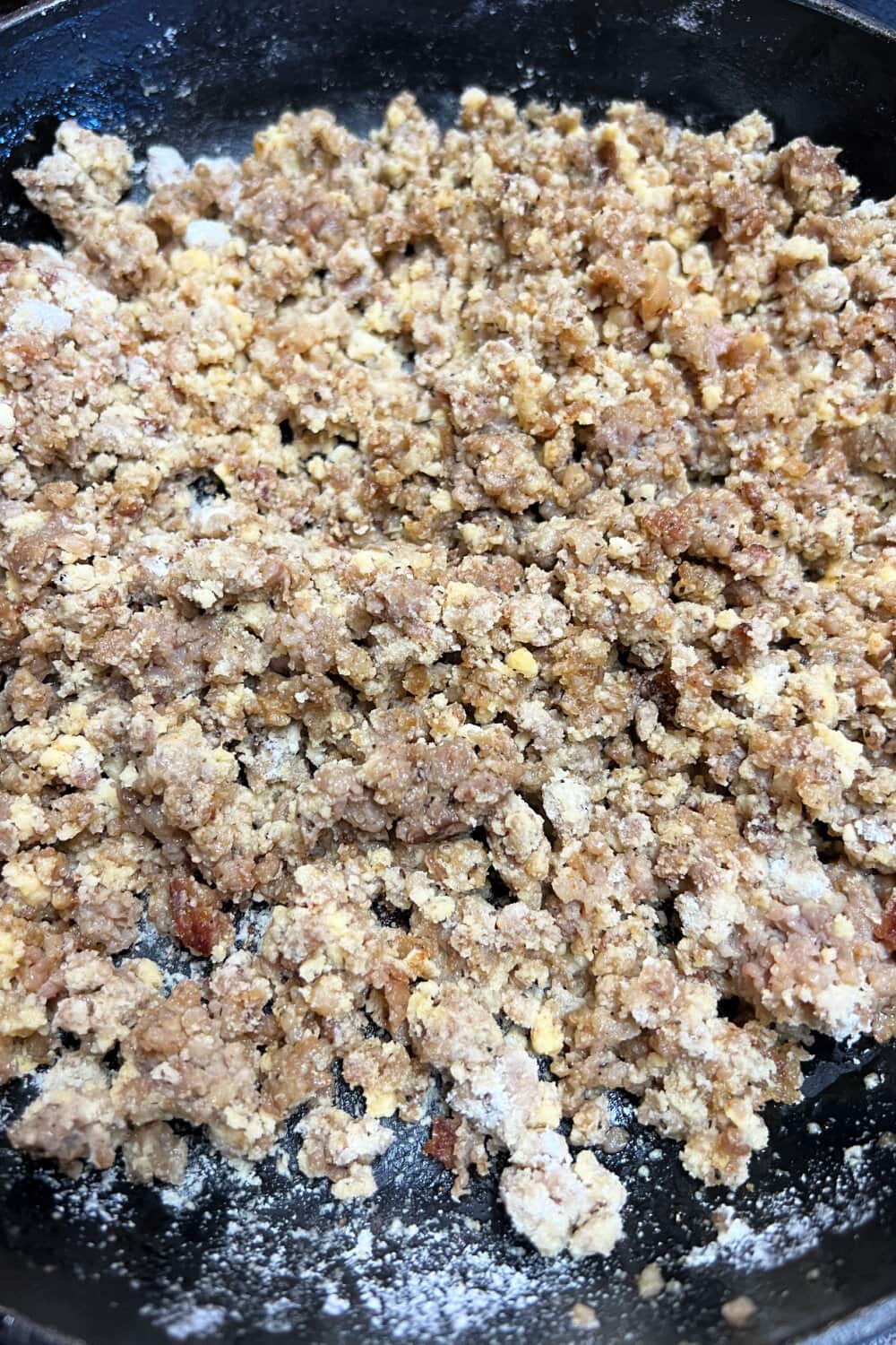 Crumbled and cooked sausage with dry gravy mix incorporated. 