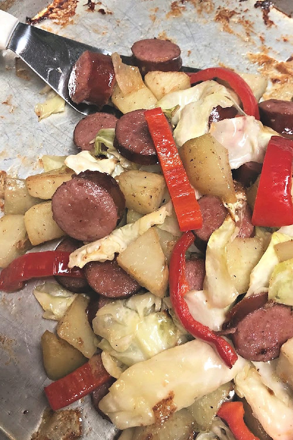 https://chefalli.com/wp-content/uploads/2023/06/sheet-pan-meal-pot-cabbage-sausage-2-copy.jpg