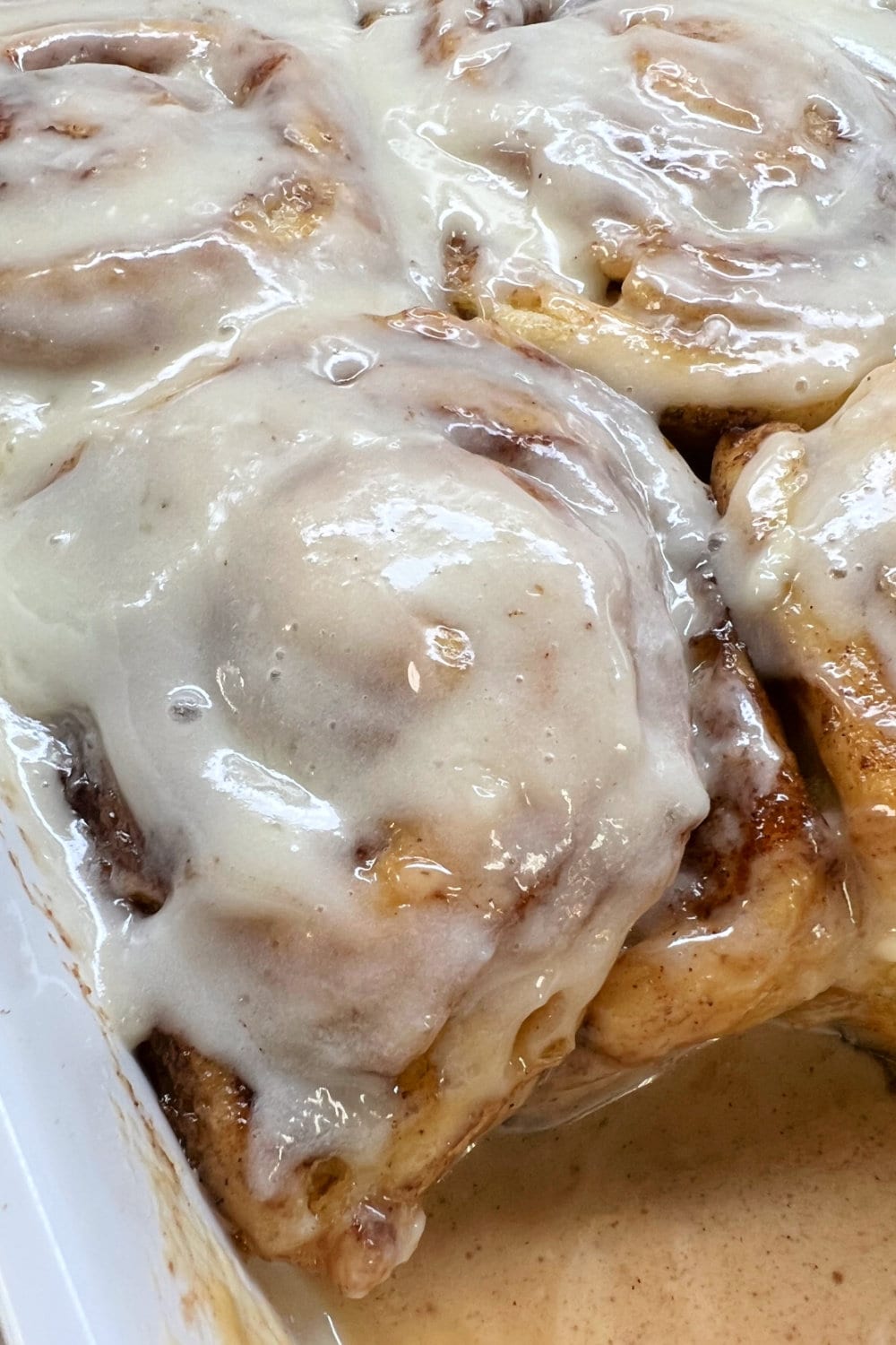 Tender and luscious cinnamon rolls in a pan. 