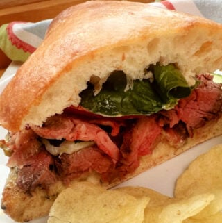 Side view of a Beef Tenderloin Sandwich.