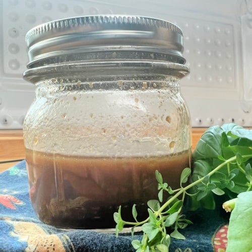 Beef tenderloin marinade stored in a canning jar.