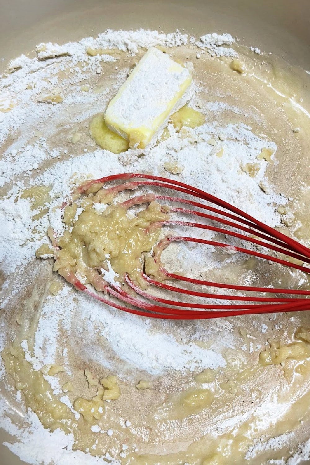 Melted butter and flour in a skillet to make a roux for sauce. 