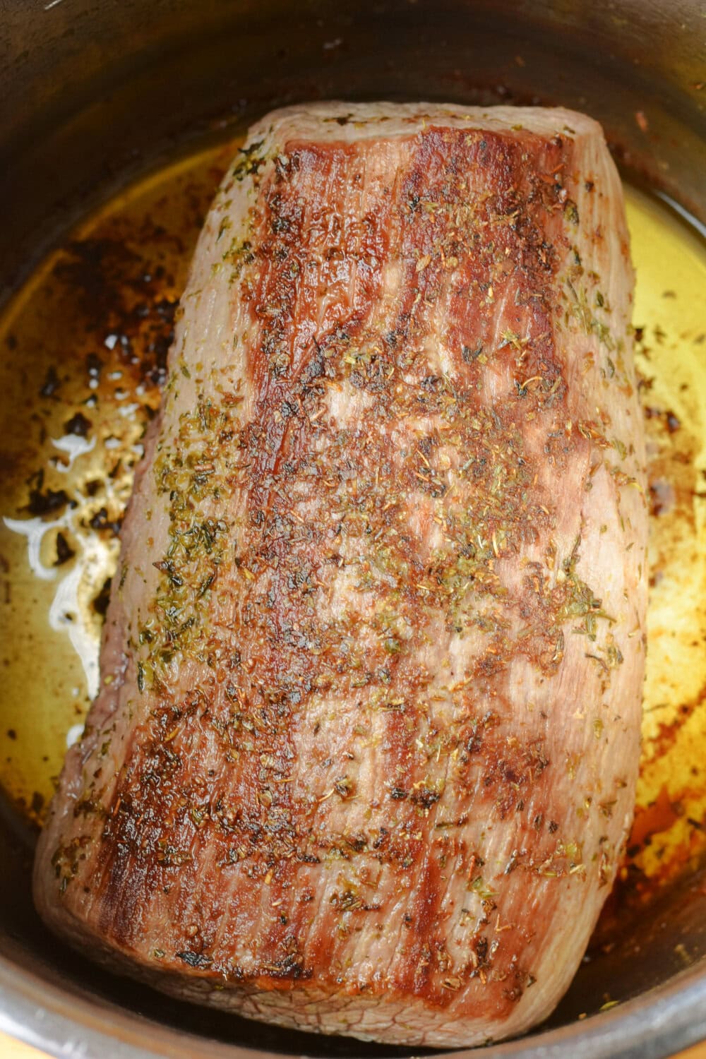 A seared eye of round roast in the Instant Pot. 