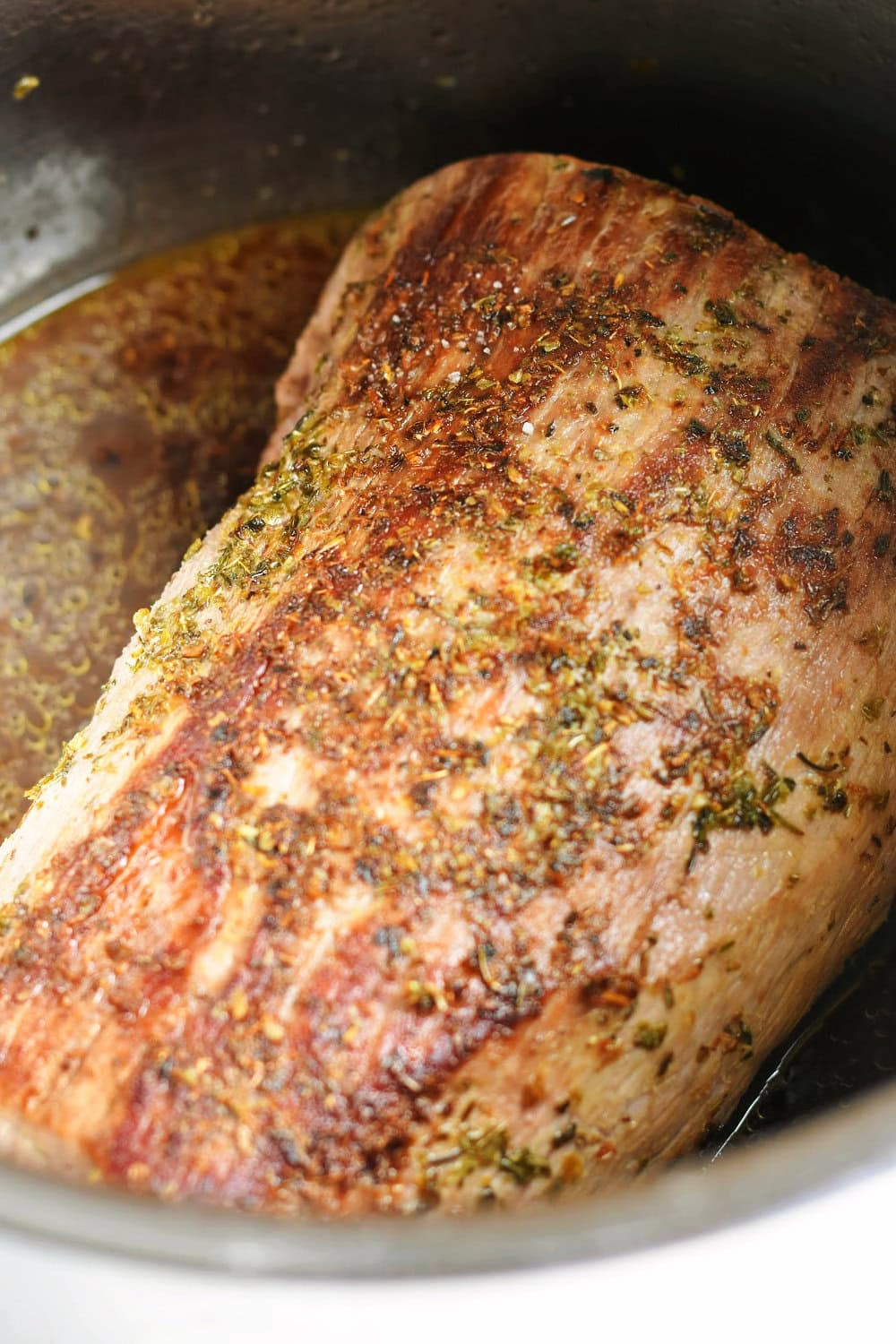 A fully cooked eye of round roast ready to be removed from the Instant Pot. 