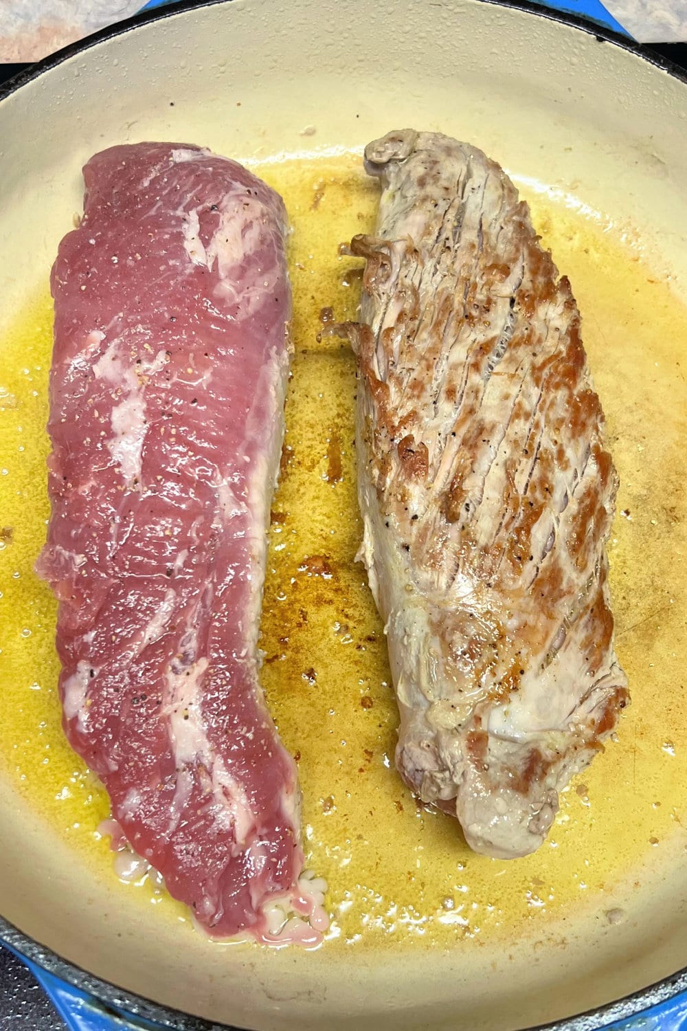 Preparing to sear the pork tenderloins in a skillet. 