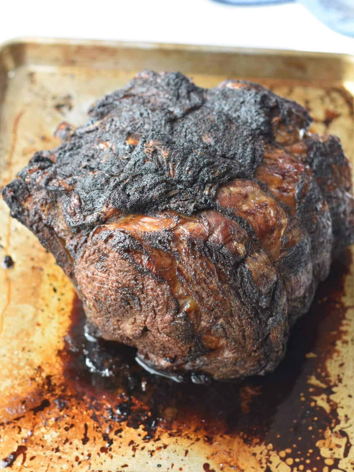 Prime-Rib-500-Rule-Finished Holiday beef roast on a sheet pan after cooking in high heat.