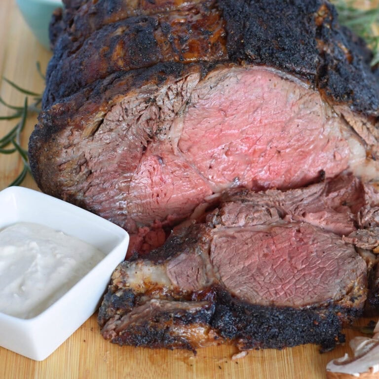 Prime Rib 500 Rule perfectly cooked on a cutting board.