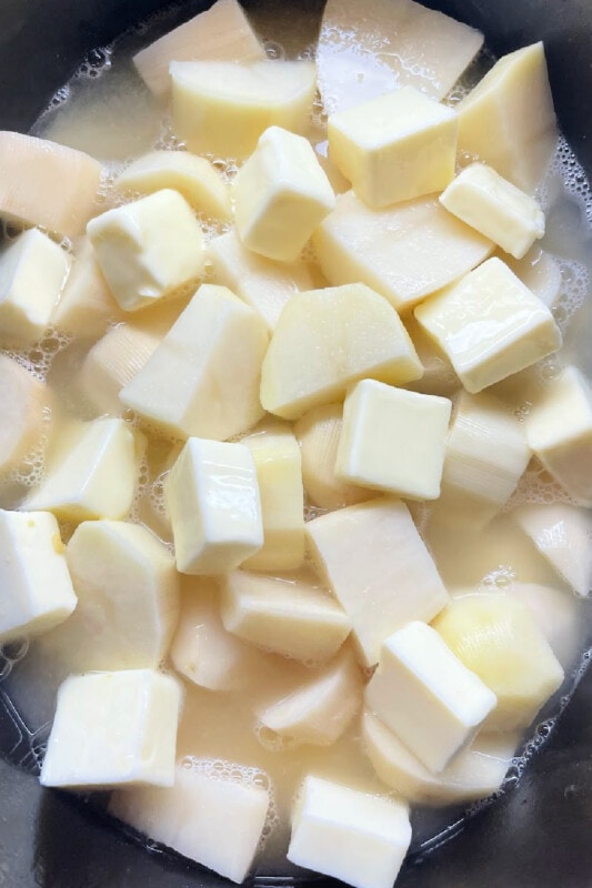 Chunks of potatoes with butter and broth. 