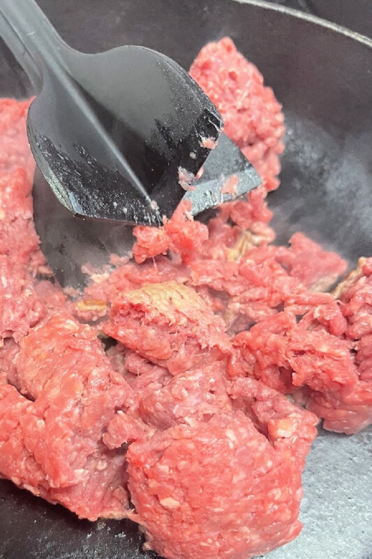 Ground beef ready to be browned in a skillet. 