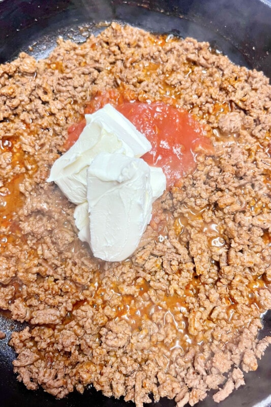Cream cheese and salsa added to seasoned ground beef. 