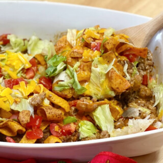 A big serving of Walking Taco Casserole with all the usual toppings.