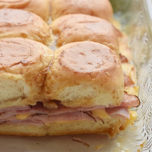 Kings Hawaiian Ham and Cheese Sliders in a glass cooking dish.