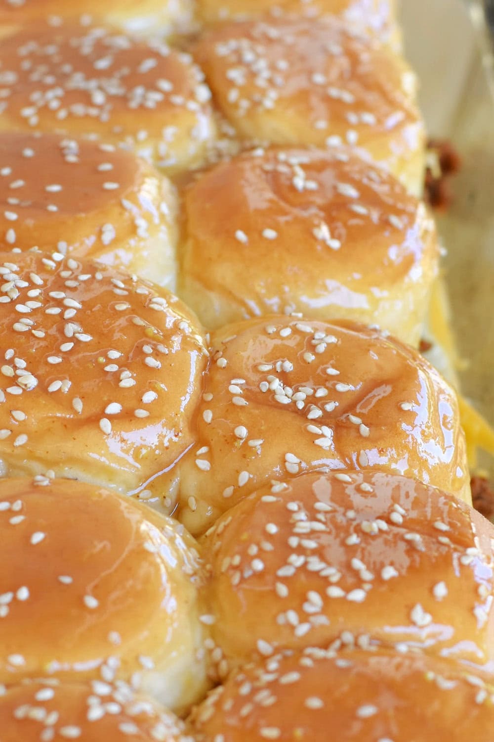 Slider buns that have been brushed with melted butter. 