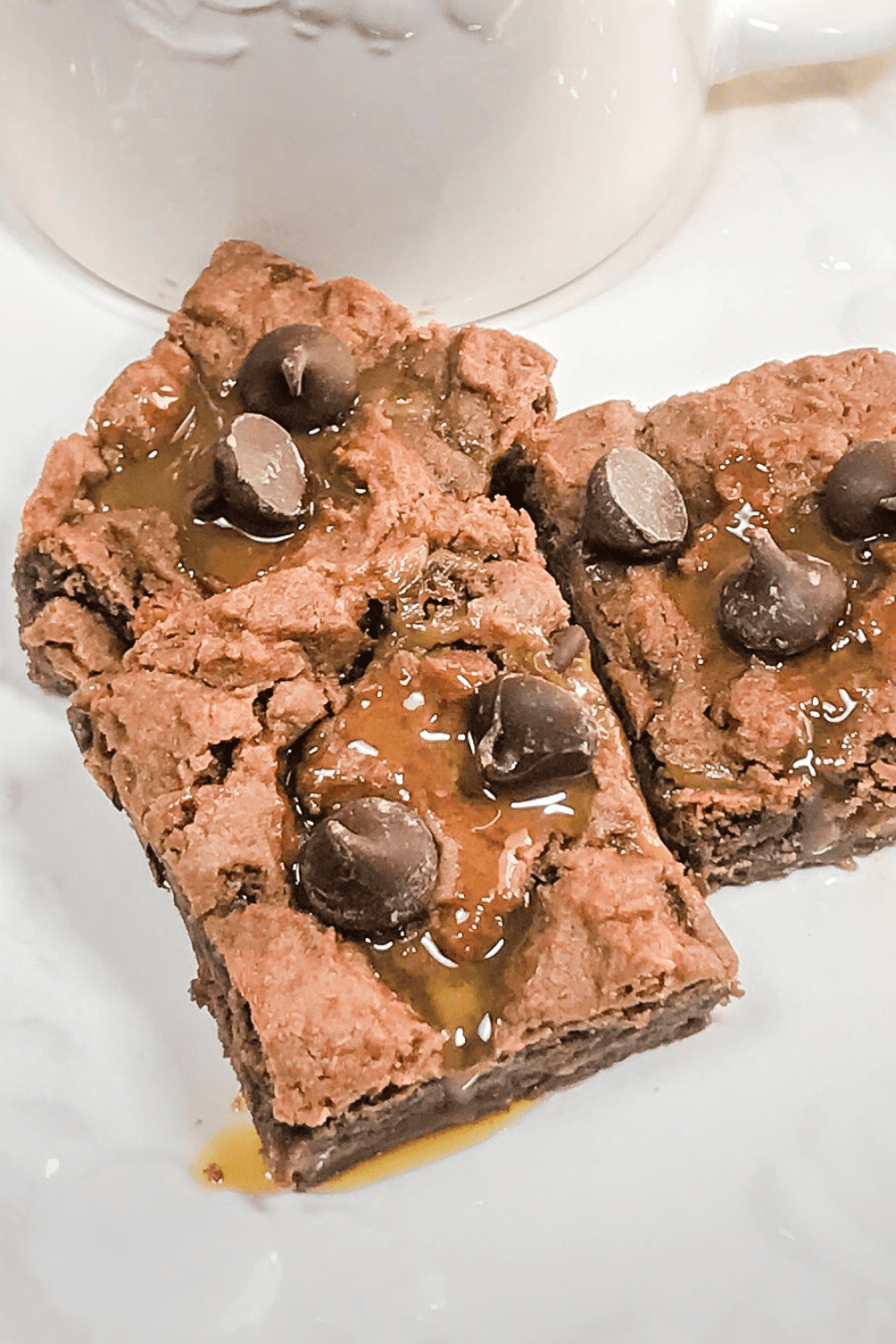 Caramel drizzled over brownies made from a cake mix. 