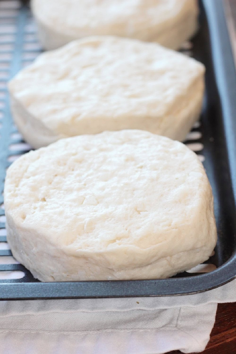 Biscuits placed into the air fryer basket to bake. 