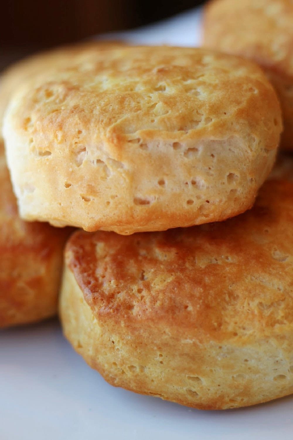 Stacked air fryer biscuits, warm and fresh. 