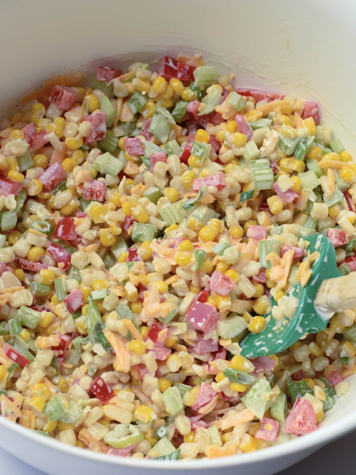 Ingredients and dressing mixed well. 