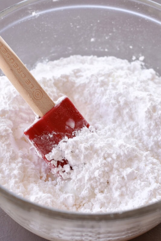 All the ingredients for stirring up cinnamon roll icing 