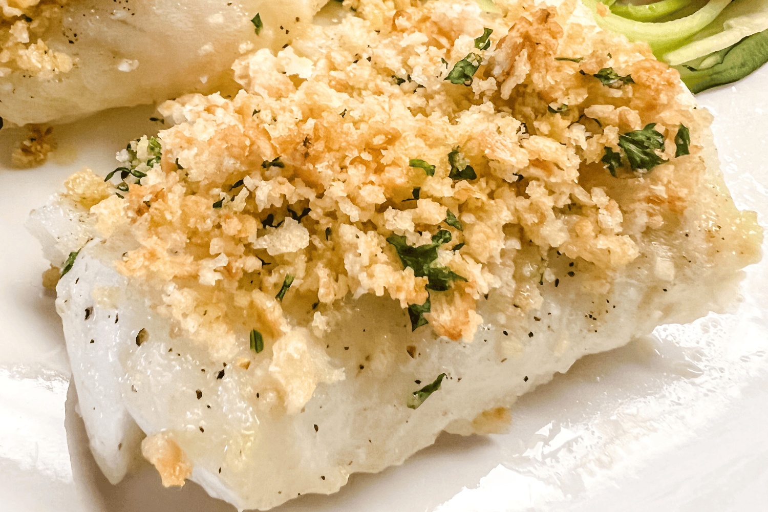 Baked cod fish with Ritz crackers and butter. 