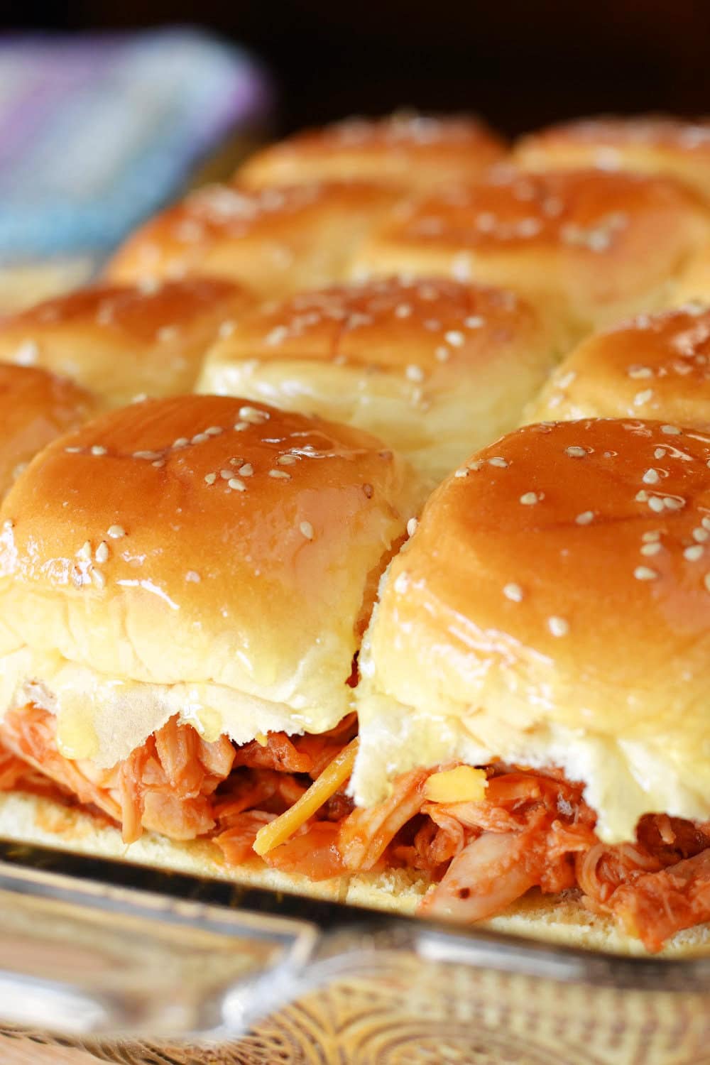 BBQ Chicken Sliders in a pan, ready for the oven. 